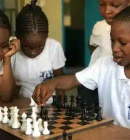 Black Children Playing Chess