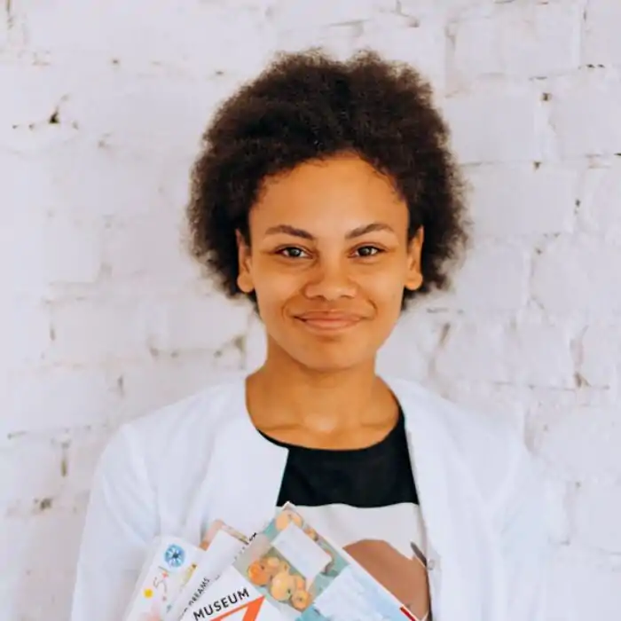 Woman Carrying Children's Learning Books